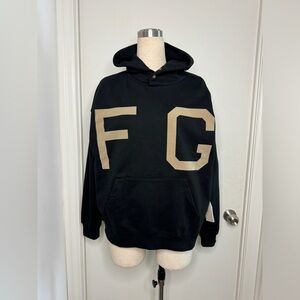 Black Fear of God Essentials hoodie